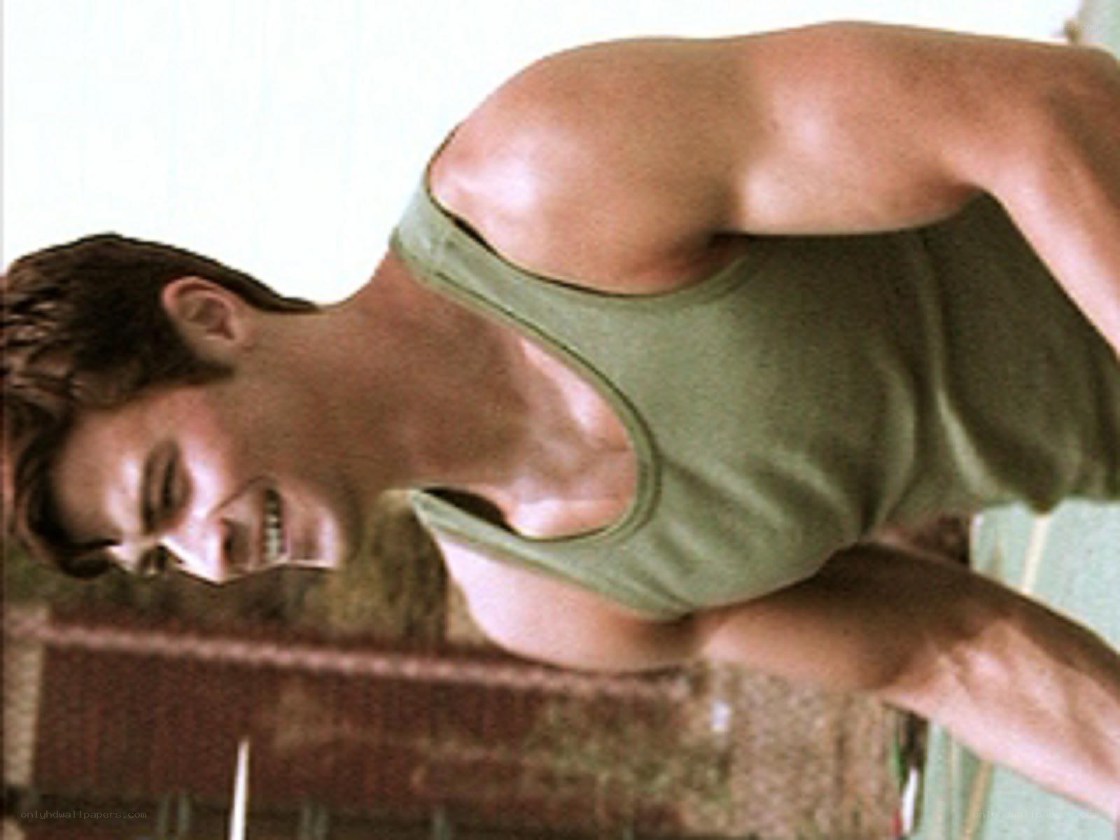 man in green tank top