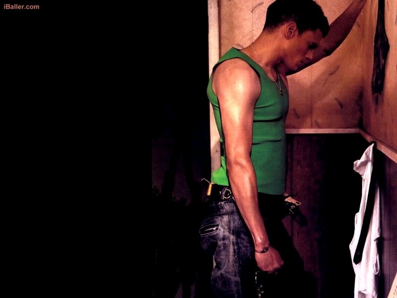 man in green tank top