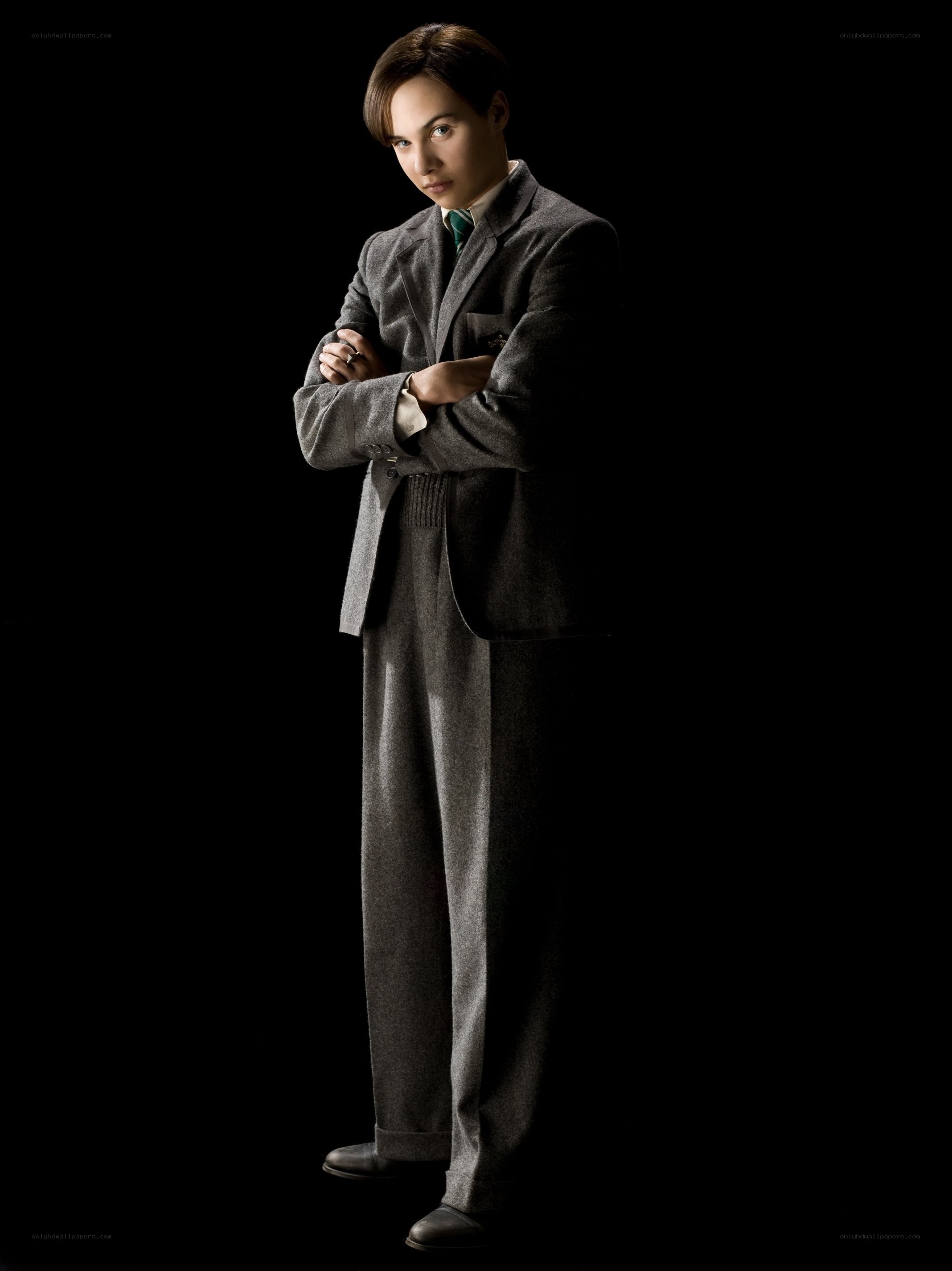 man in grey suit standing