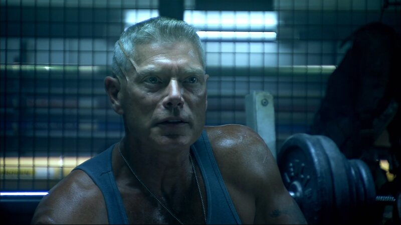 man in gym wearing tank top