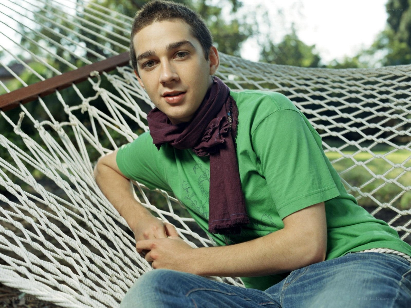 man in hammock outdoors