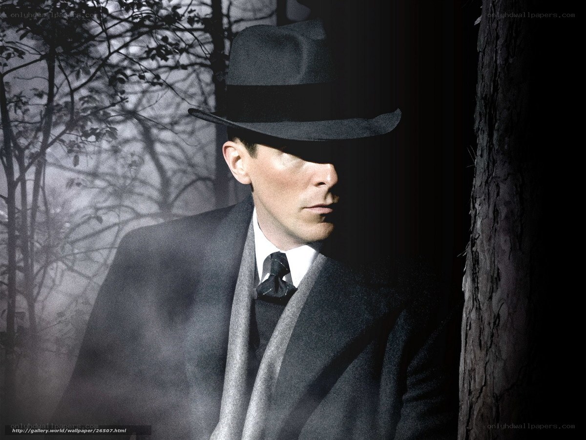 man in hat and coat