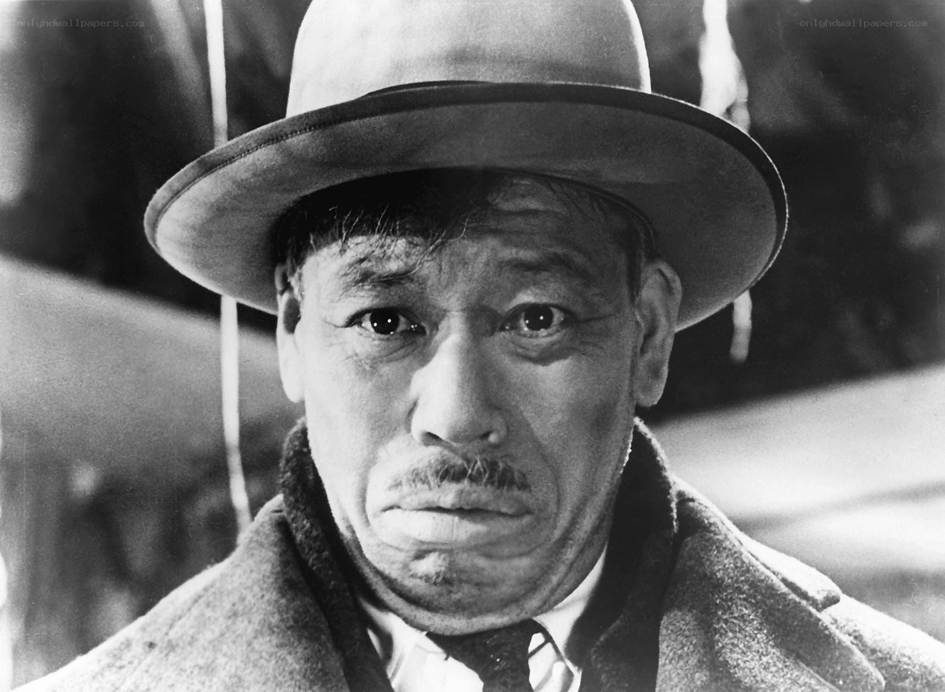 man in hat and coat