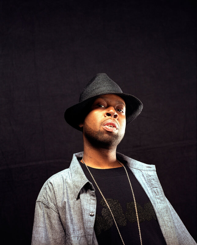 man in hat and denim jacket