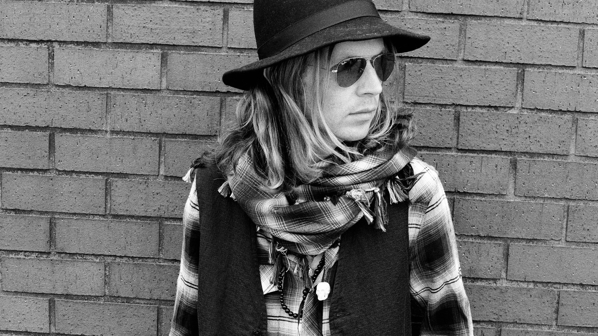man in hat and scarf
