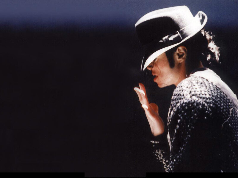 Man in Hat and Sequined Jacket