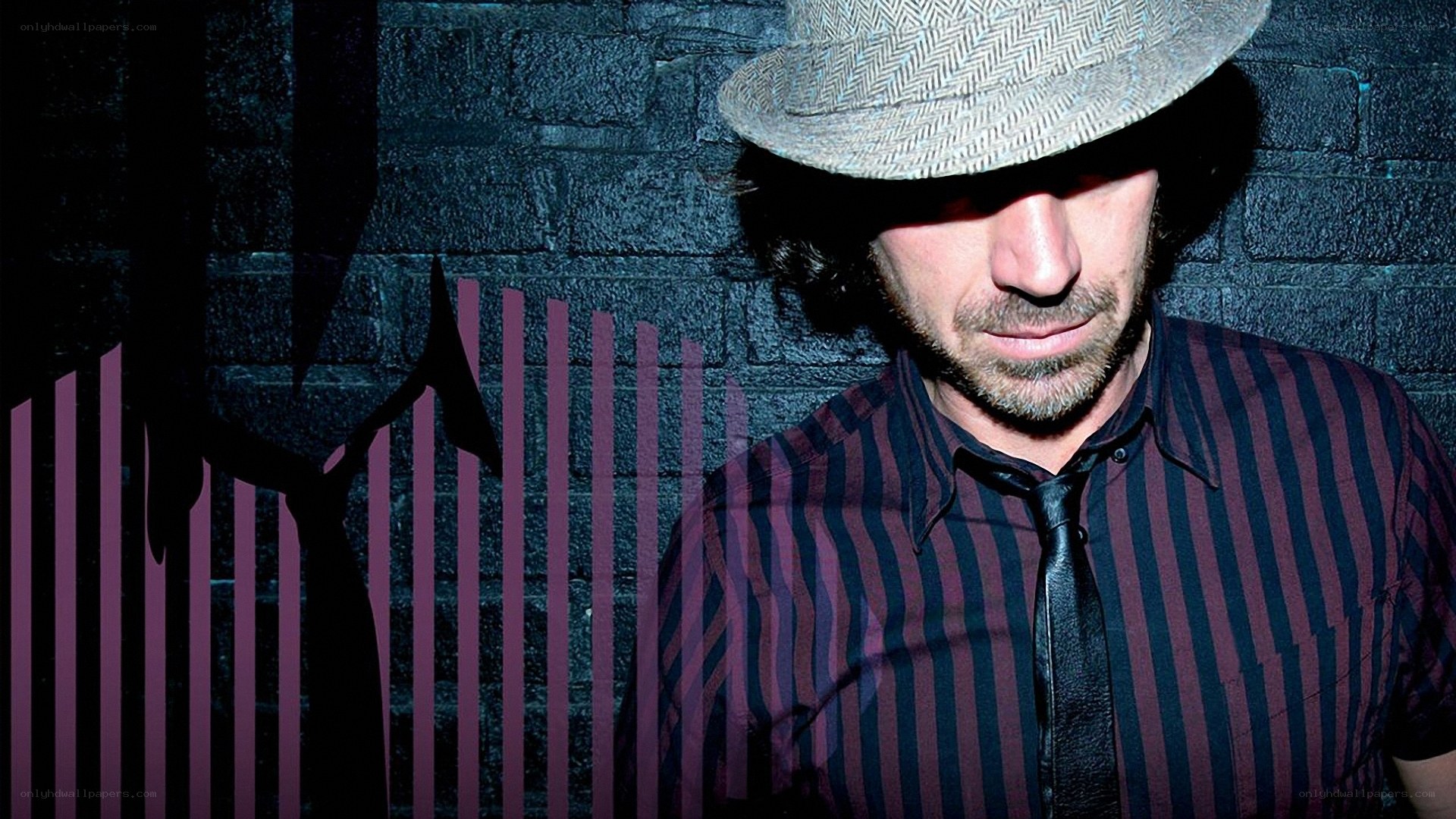 man in hat and striped shirt