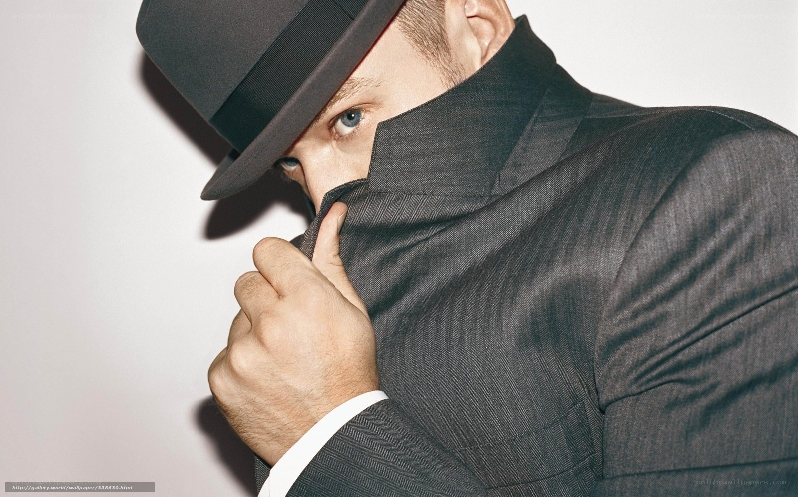 man in hat and suit