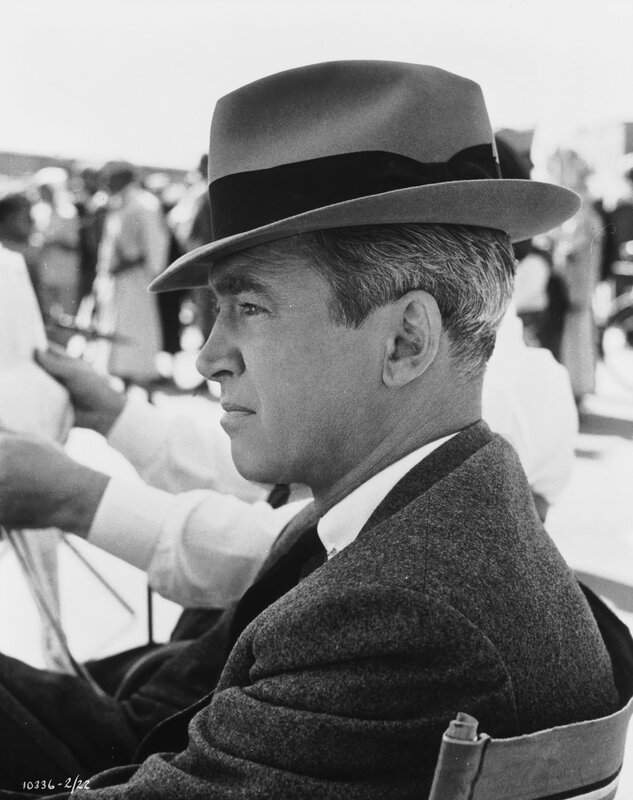 Man in hat and suit