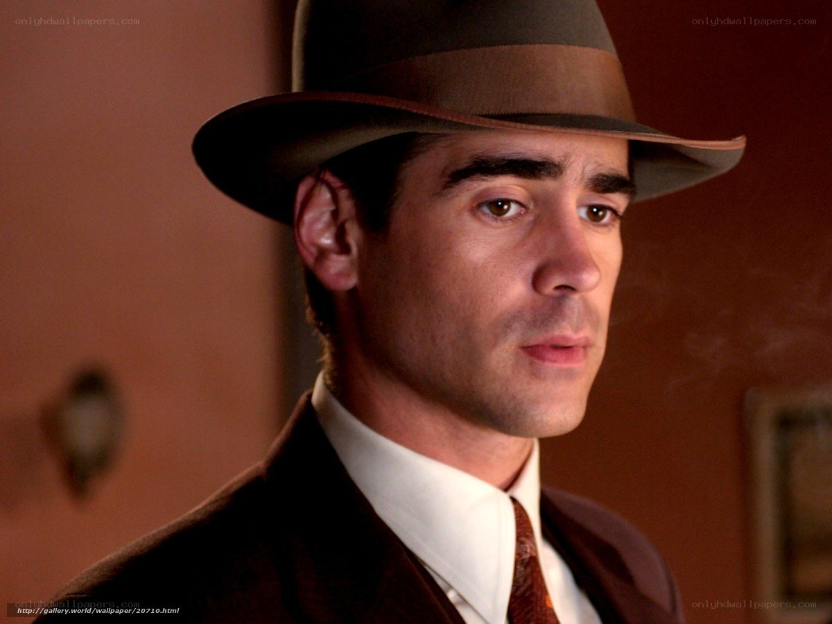 man in hat and suit