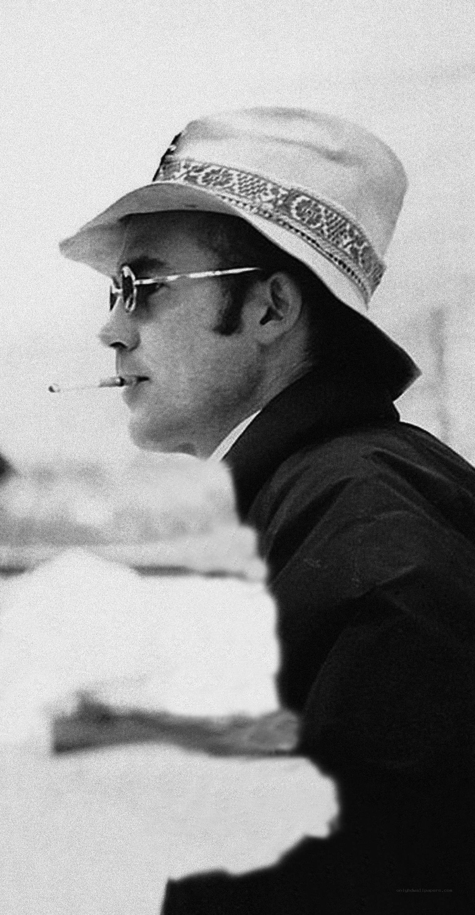 man in hat and sunglasses