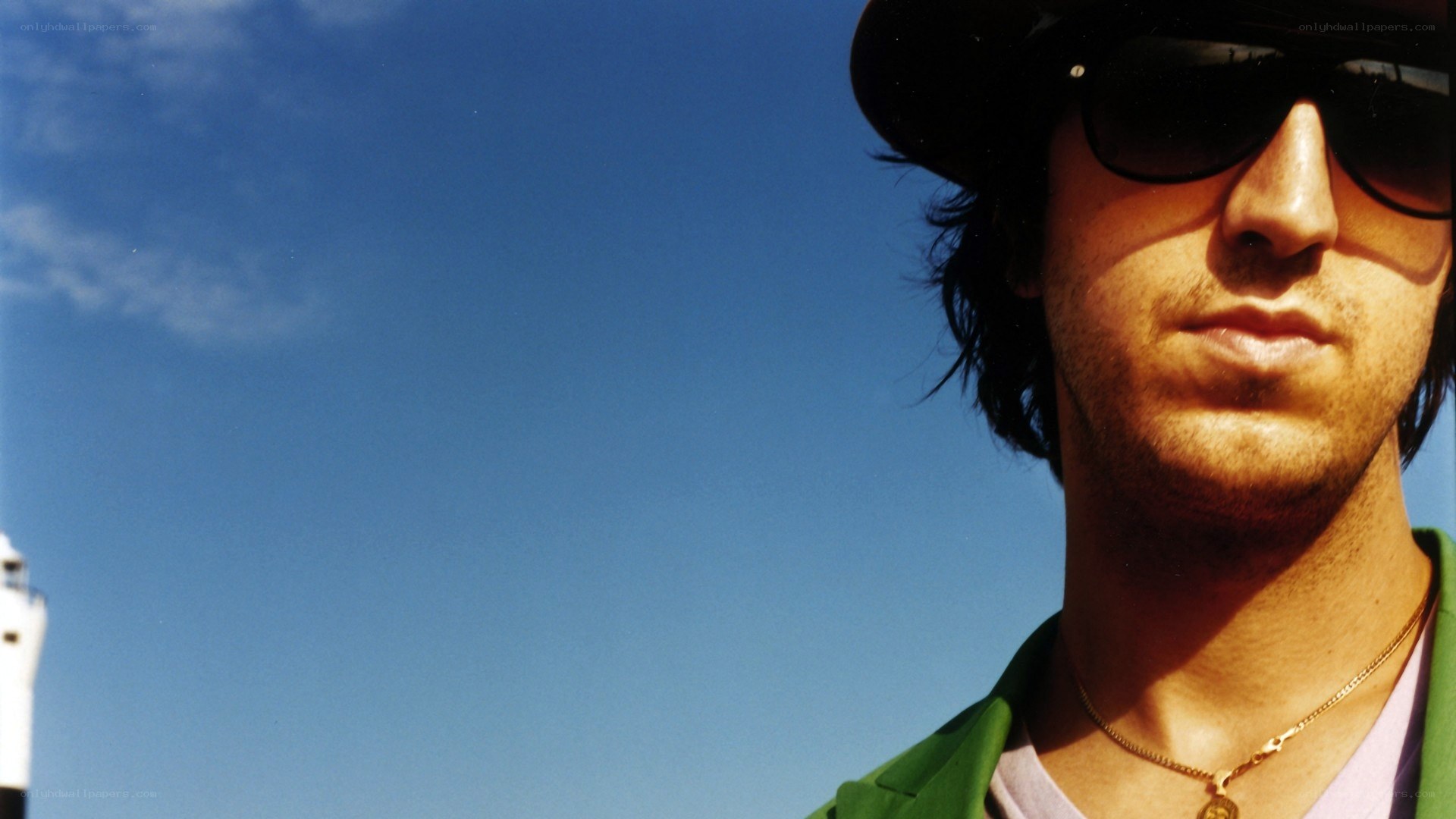 man in hat and sunglasses