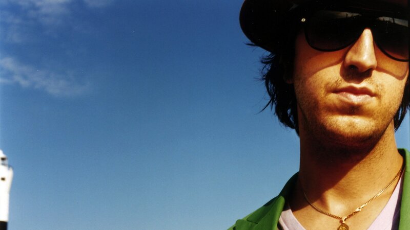 Man in Hat and Sunglasses — Blue