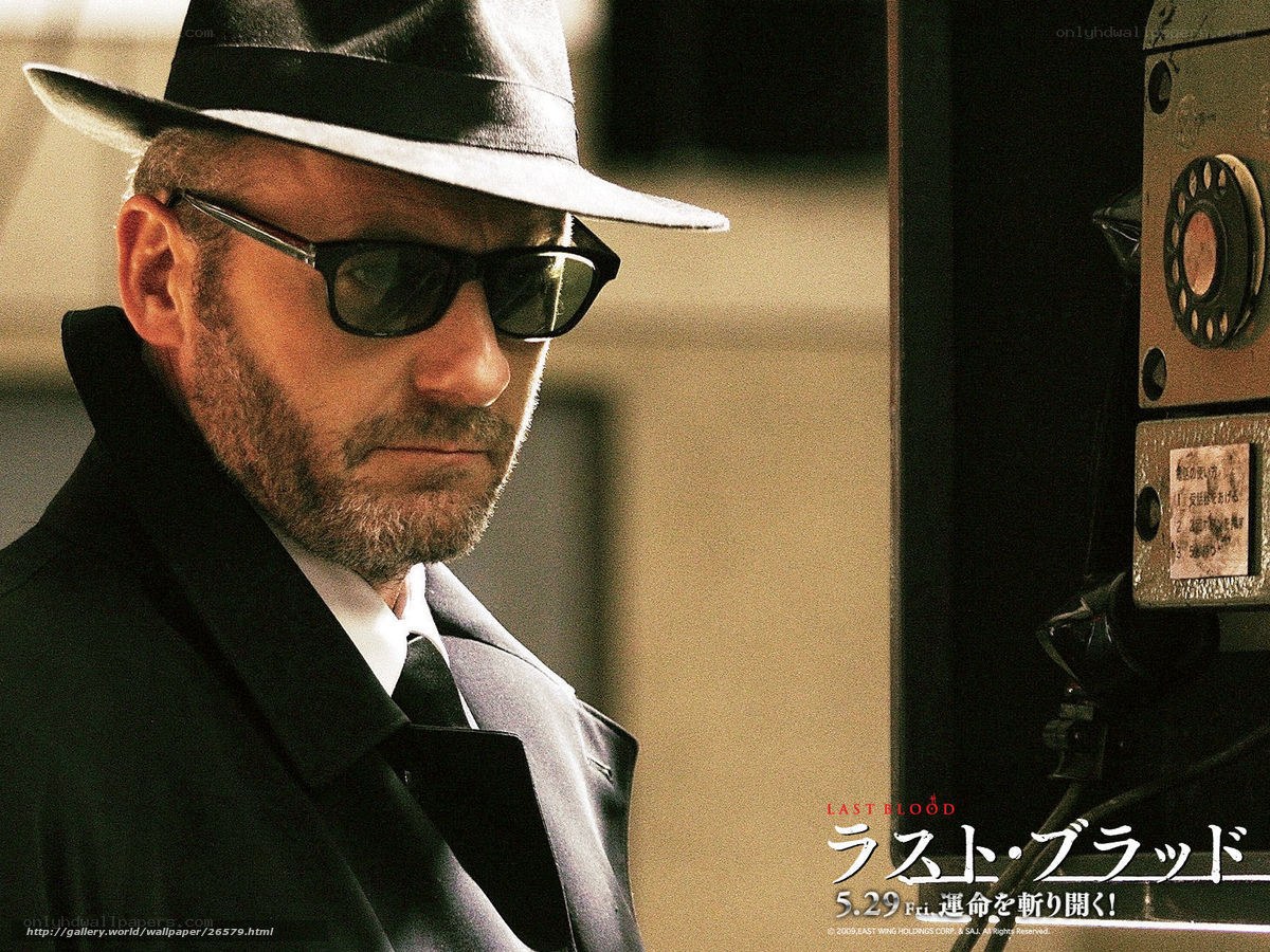 Man in hat and sunglasses