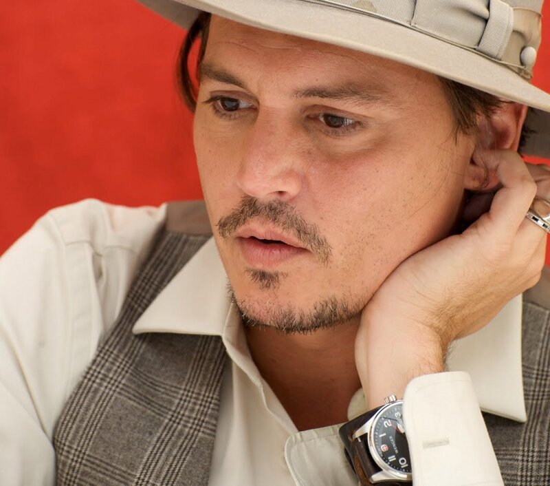 Man in Hat and Vest — Red, Contemplative