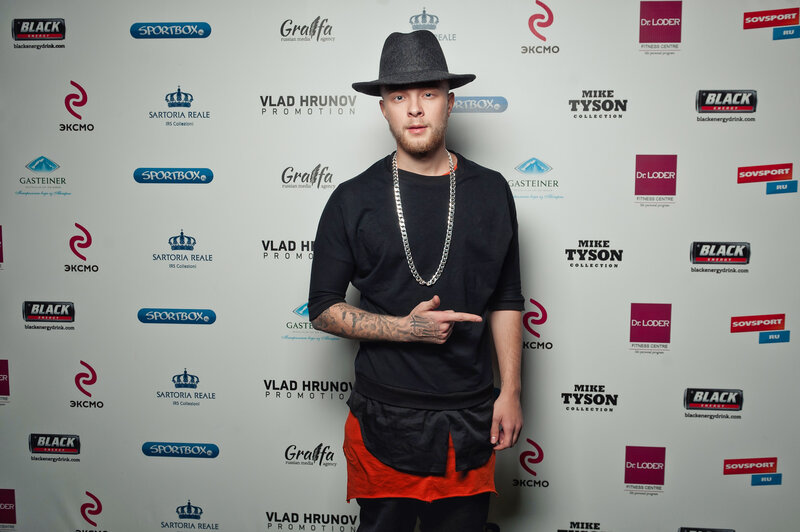 Man in hat at event