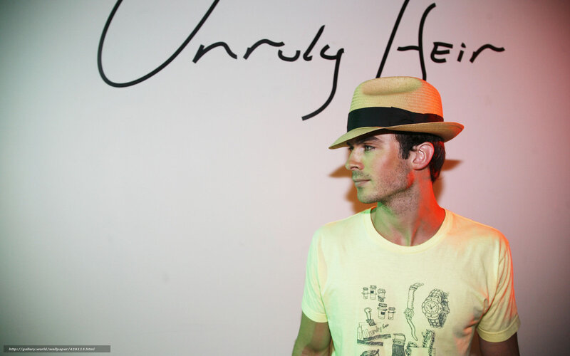 man in hat at event