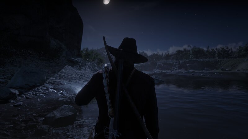 Man in Hat by River
