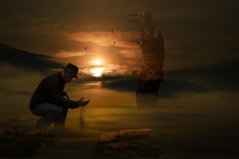 Man in Hat Crouching