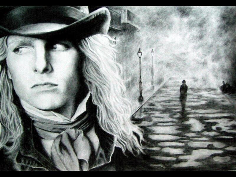 man in hat on cobblestone street