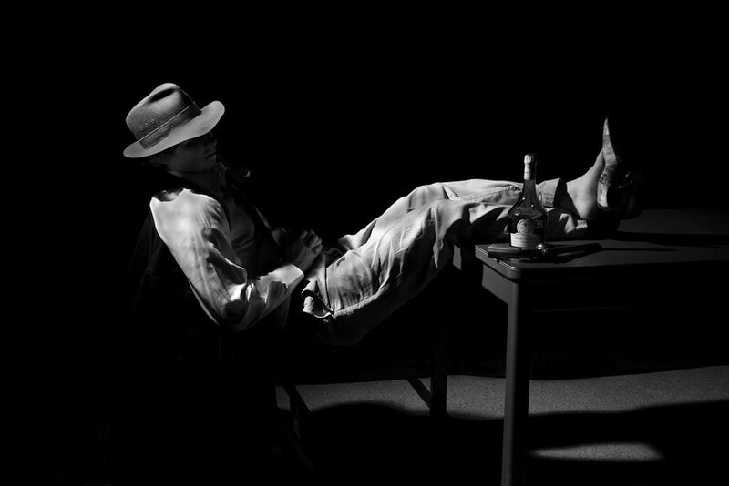 Man in Hat Reclining