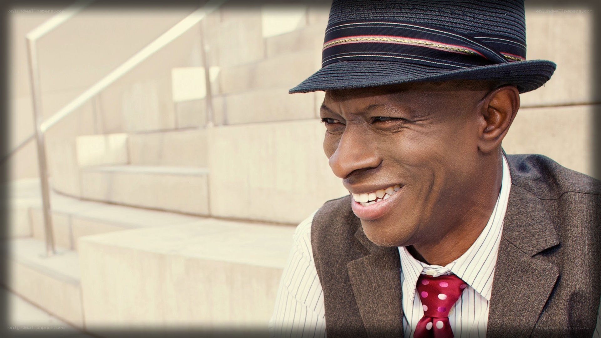 man in hat smiling