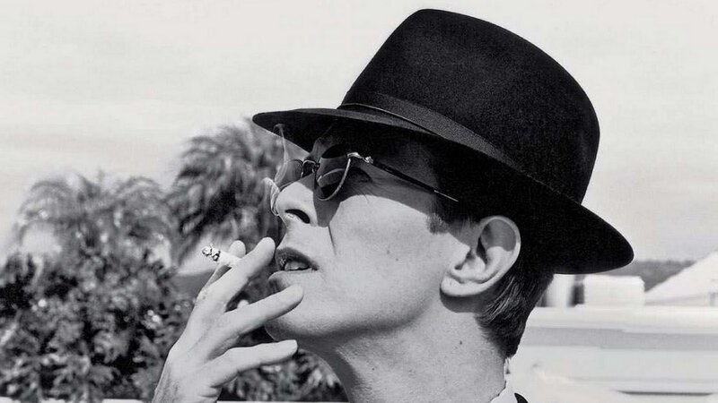 Man in Hat Smoking — Black, Contemplative
