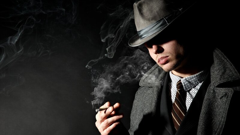 man in hat smoking cigar