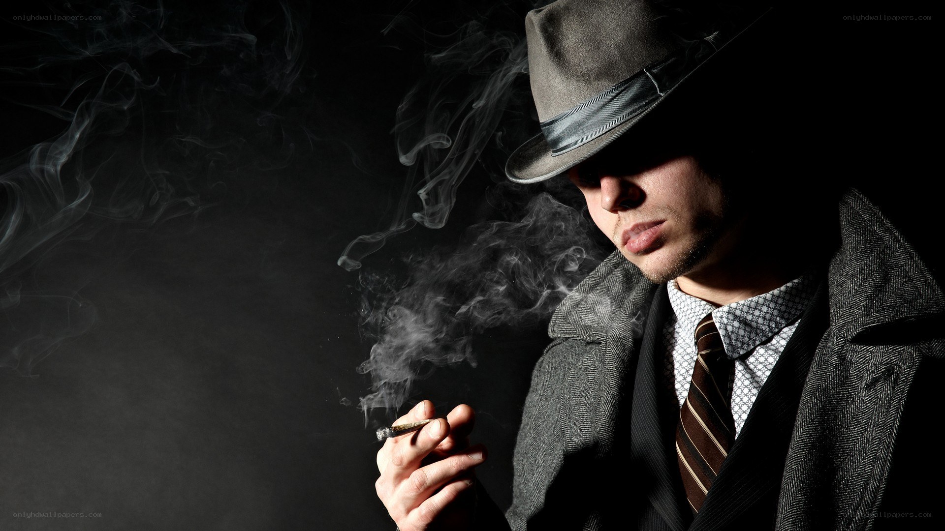 man in hat smoking cigar