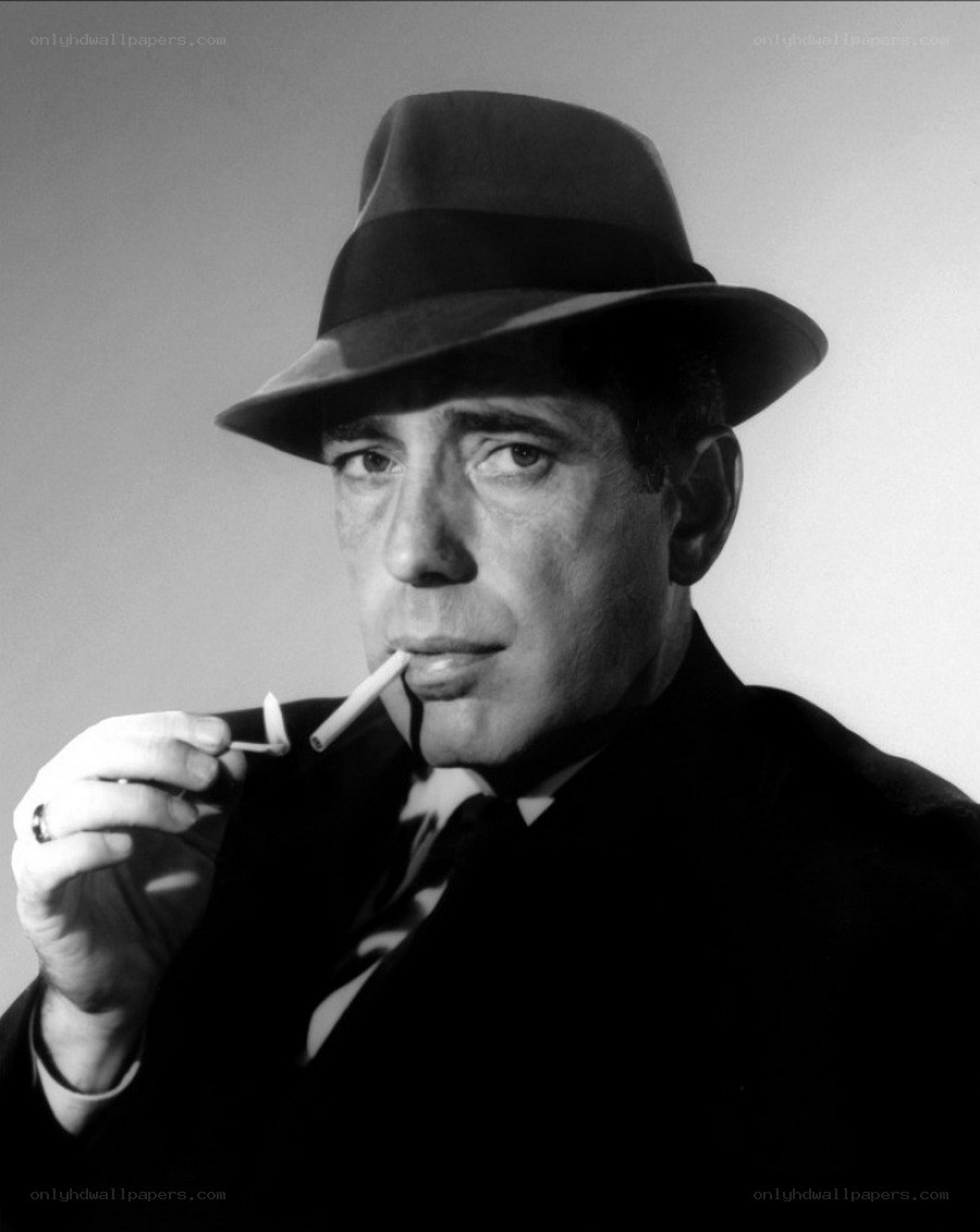 man in hat smoking cigarette