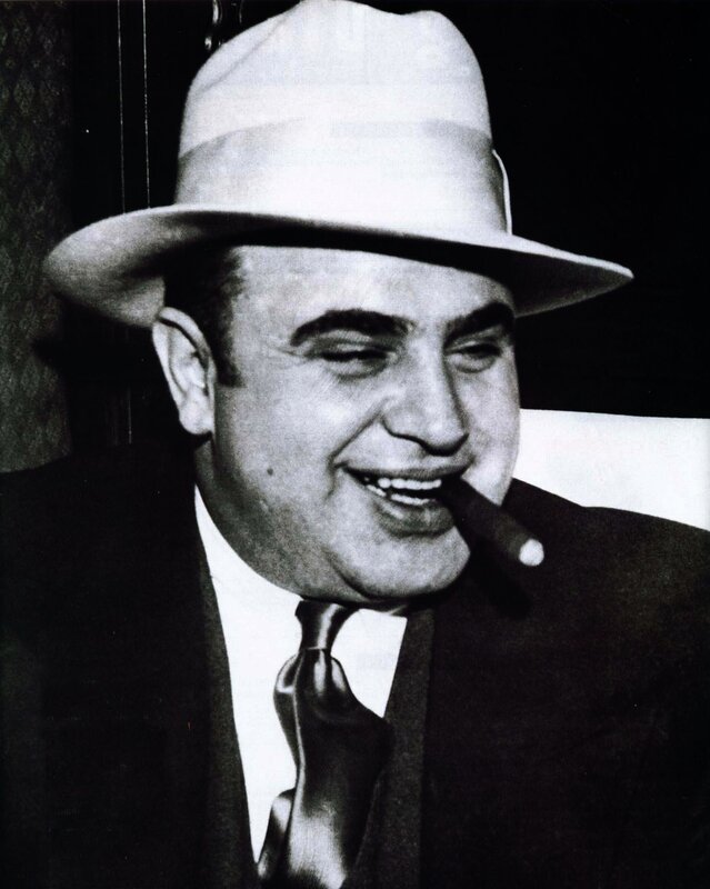 Man in hat with cigar