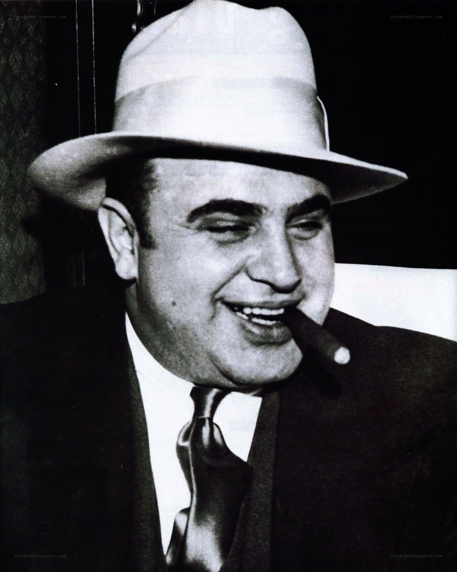 Man in hat with cigar