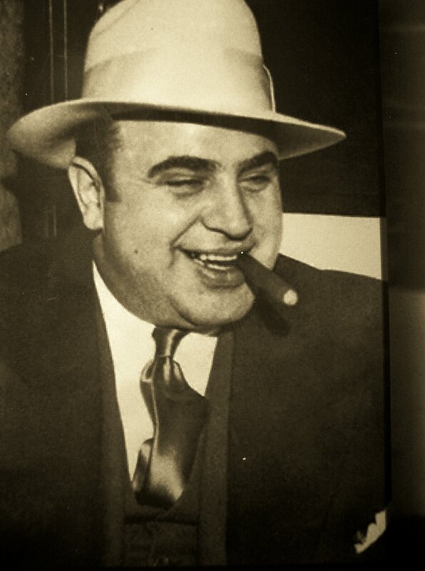 Man in hat with cigar