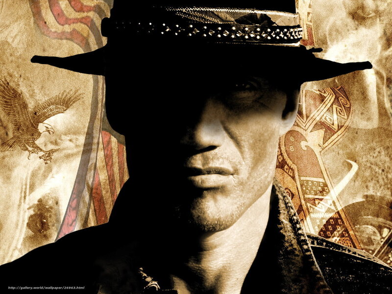 man in hat with eagle background