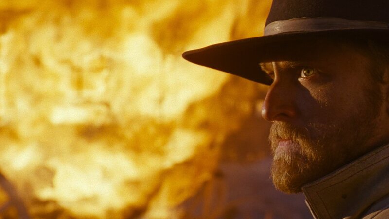 man in hat with fire