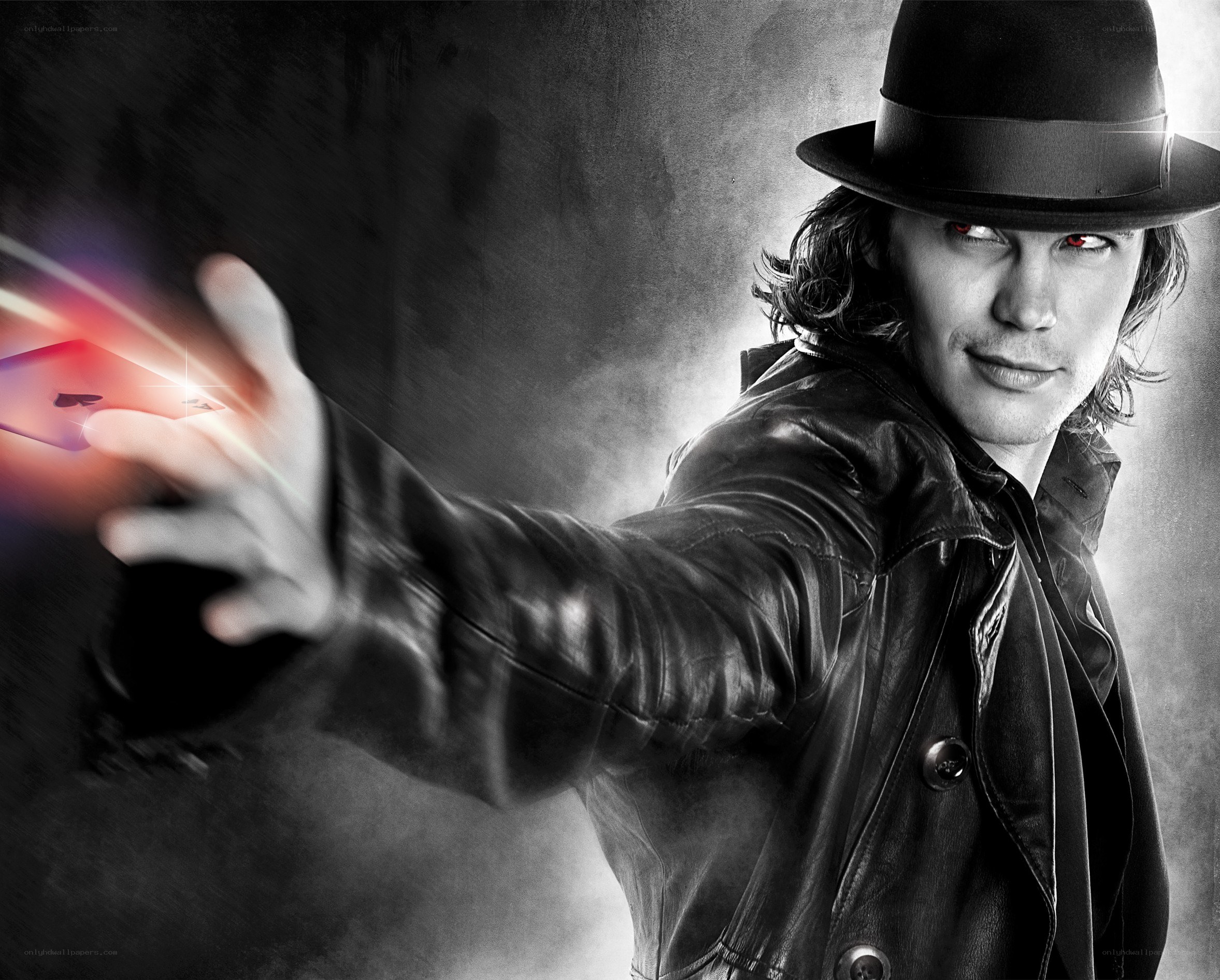 man in hat with glowing card