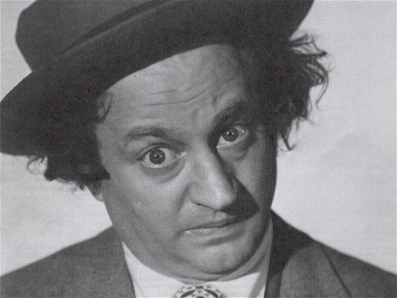 man in hat with wide eyes
