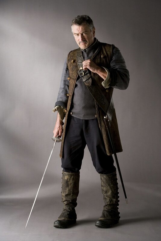 Man in historical costume with sword