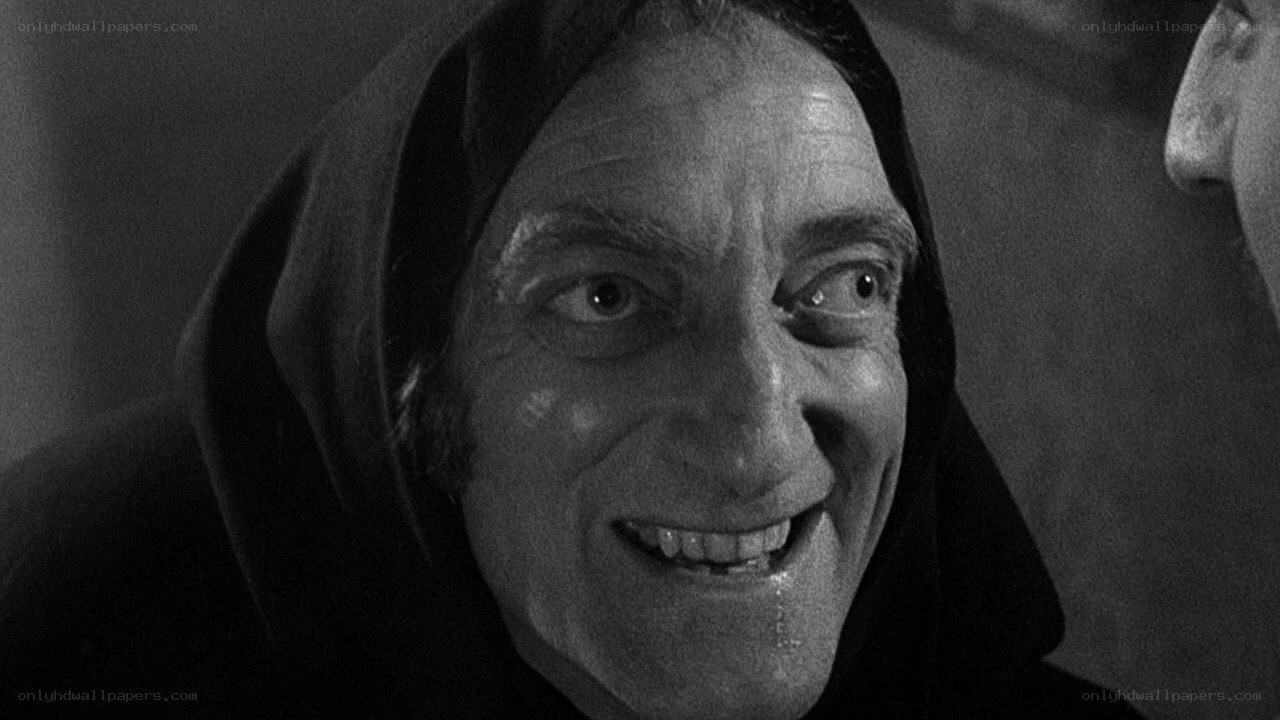 man in hooded cloak