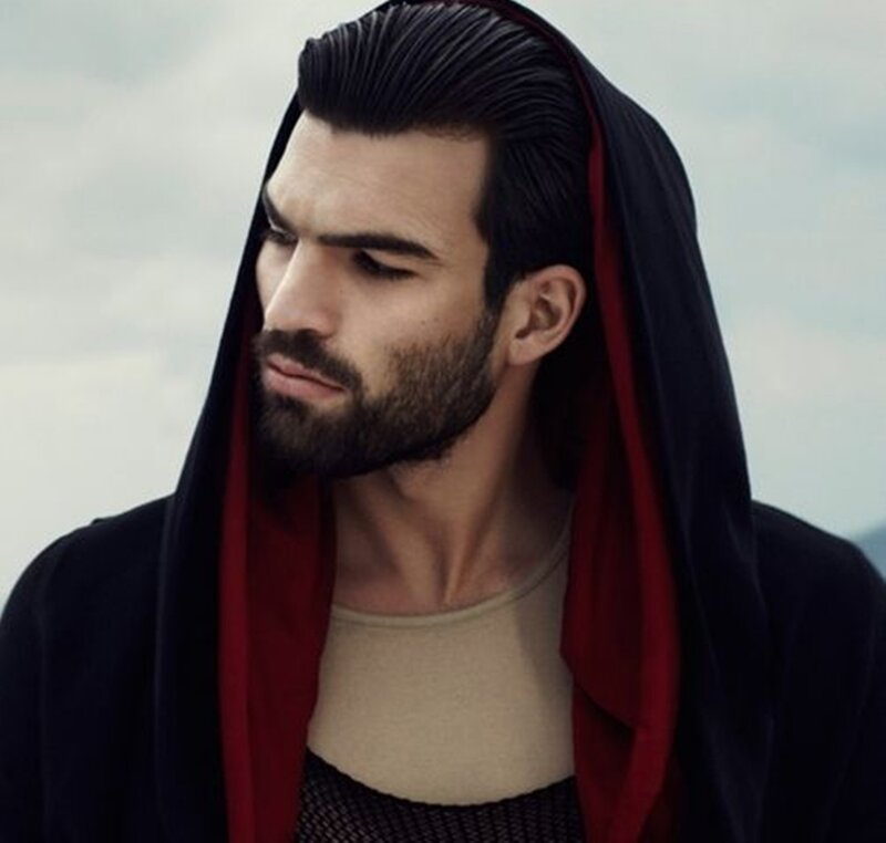Man in Hooded Cloak — Black, Dramatic, Photograph