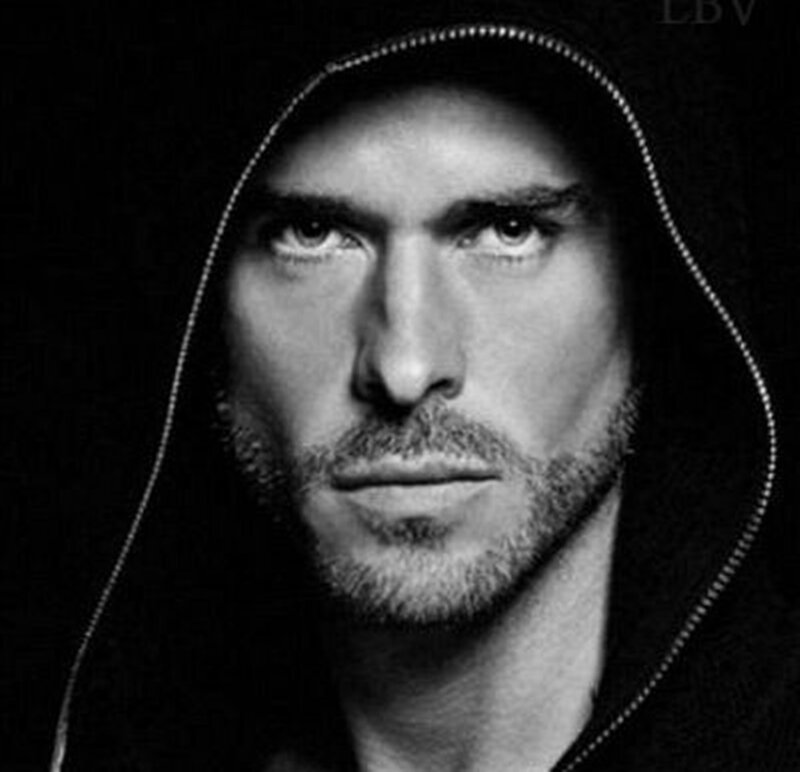 Man in Hooded Jacket — Black, Dramatic, Photograph, Hoodie
