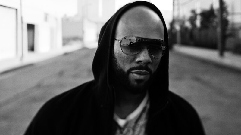 man in hoodie and sunglasses