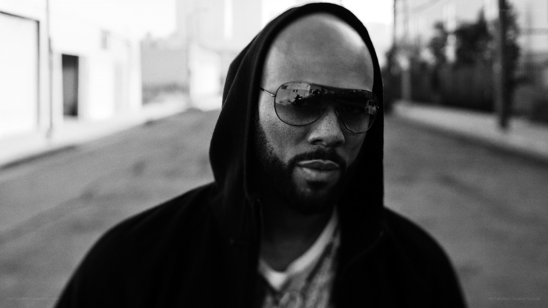 man in hoodie and sunglasses