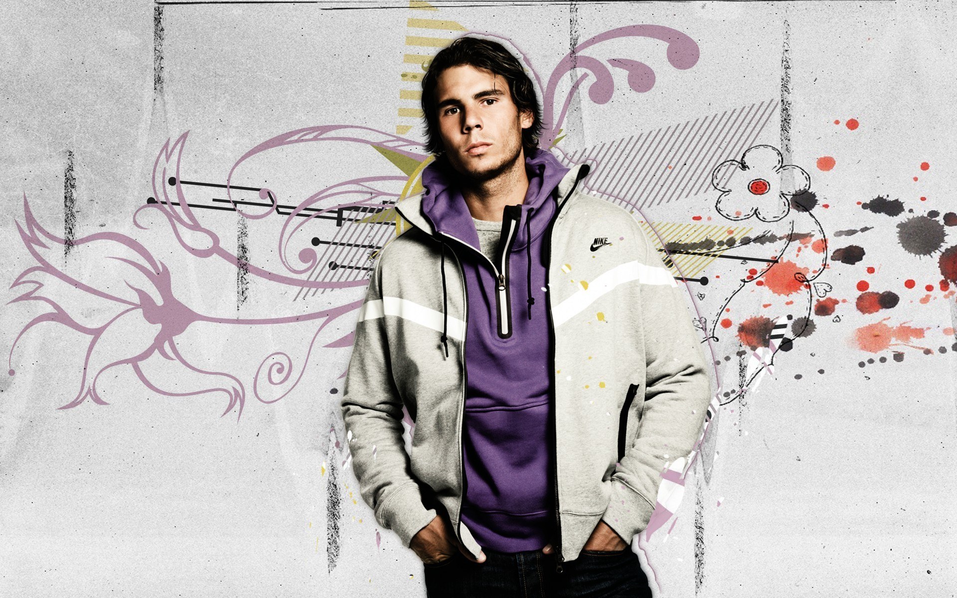 man in hoodie with graffiti background