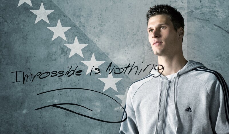 Man in hoodie with motivational quote