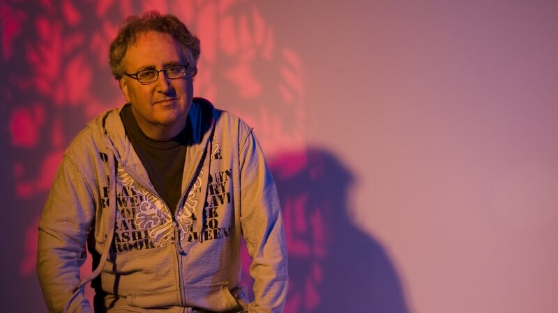 Man in hoodie with shadow