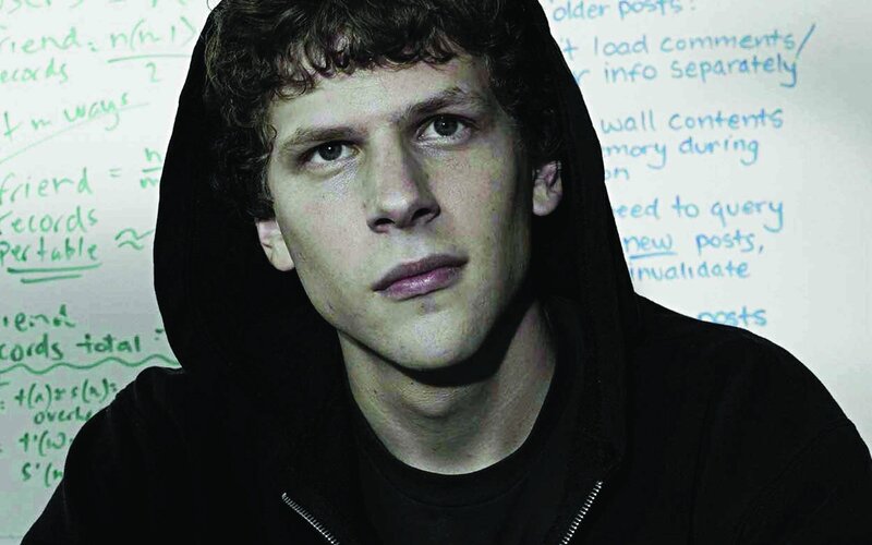 man in hoodie with whiteboard
