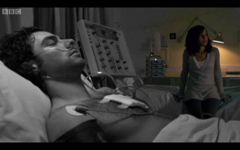 Man in Hospital Bed — Black