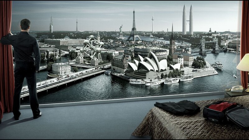 Man in hotel room with city view