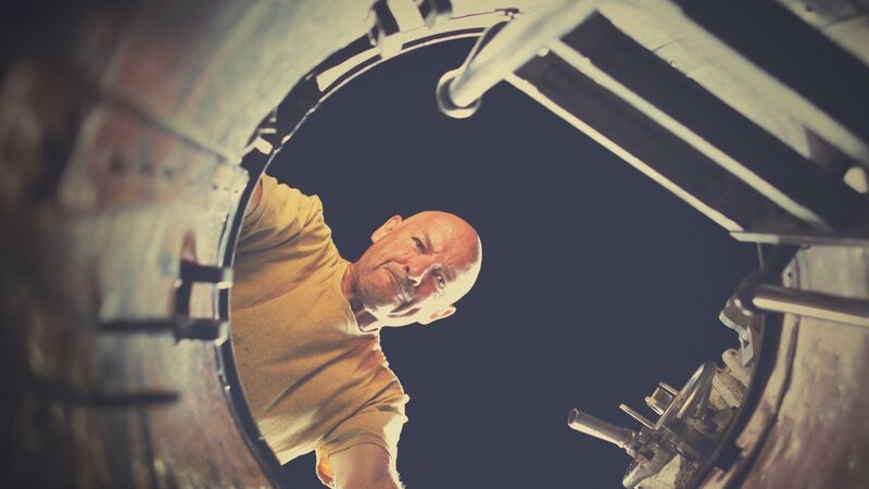 man in industrial setting